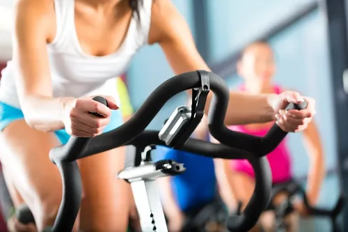 Young People Spinning in the fitness gym