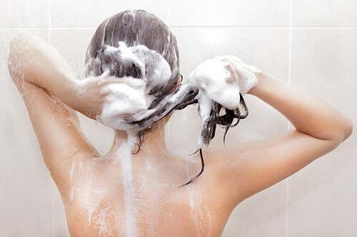 A woman showering.