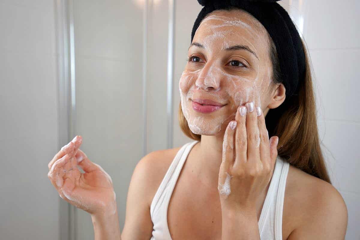 A woman with cream on her face.
