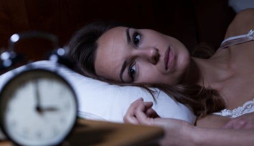 Mujer con insomnio