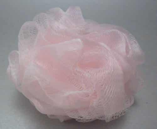 Esponja exfoliante de nylon rosa