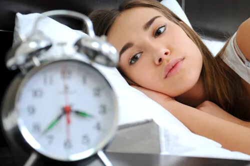 Mujer con insomnio