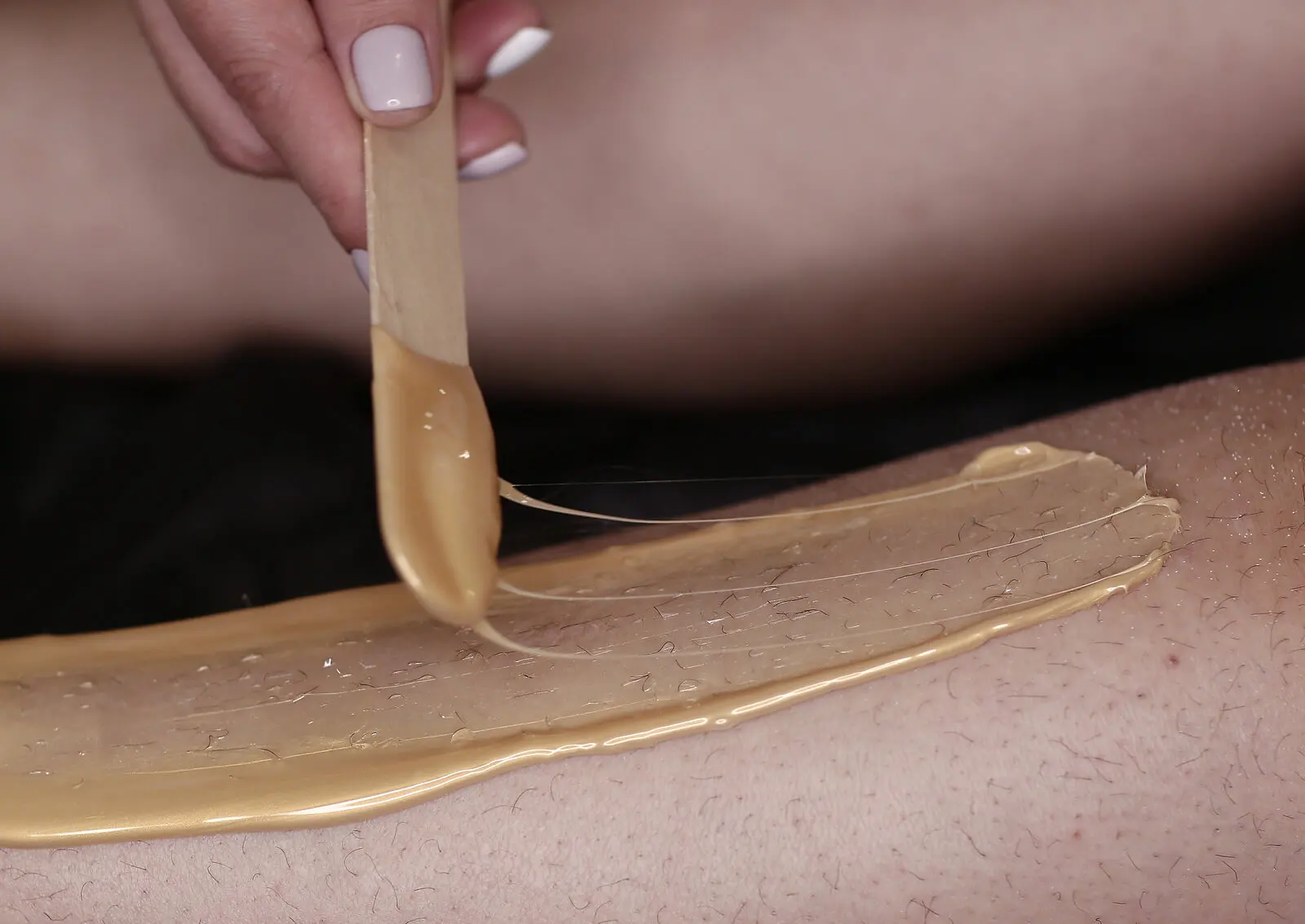 Wax hair removal.