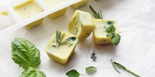 Frozen blocks of olive oil with fresh herbs.