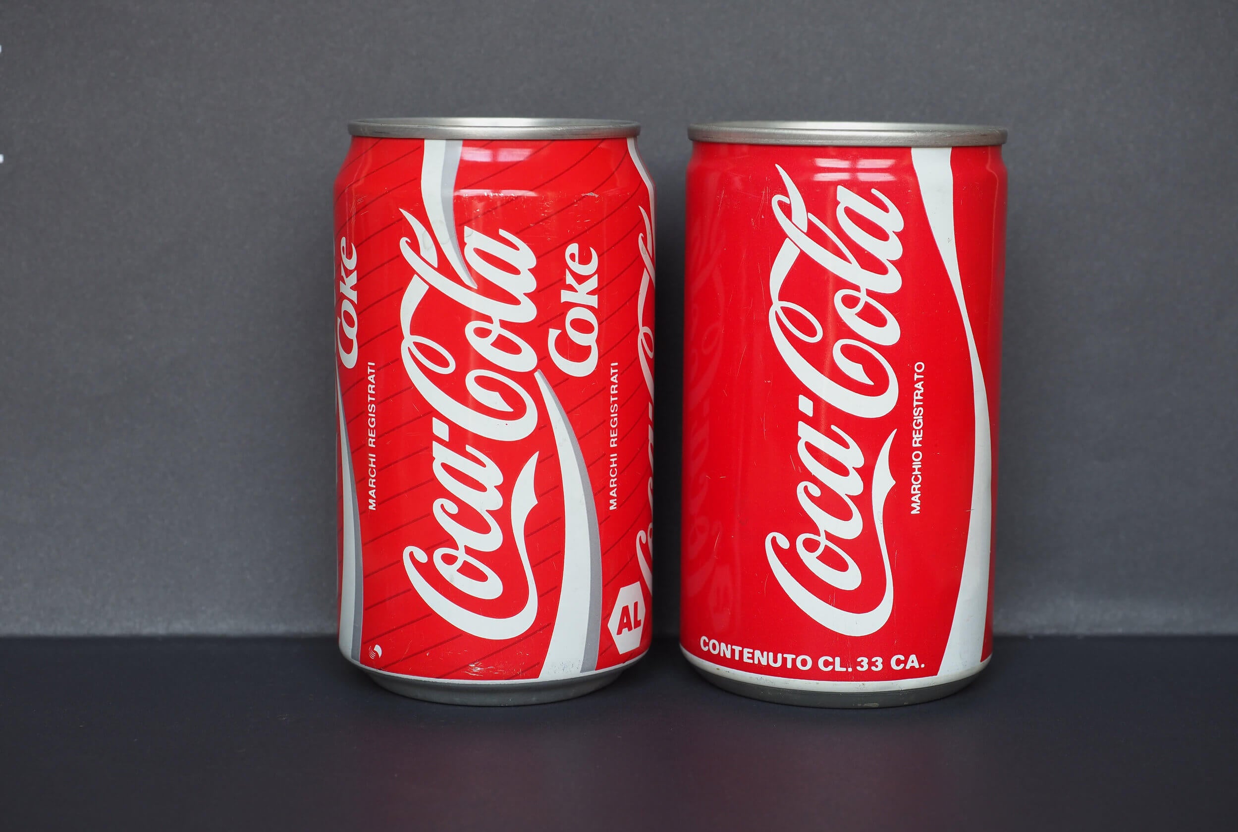 Two cans of Coke.