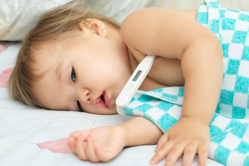 A baby with the symptoms of coxsackievirus.