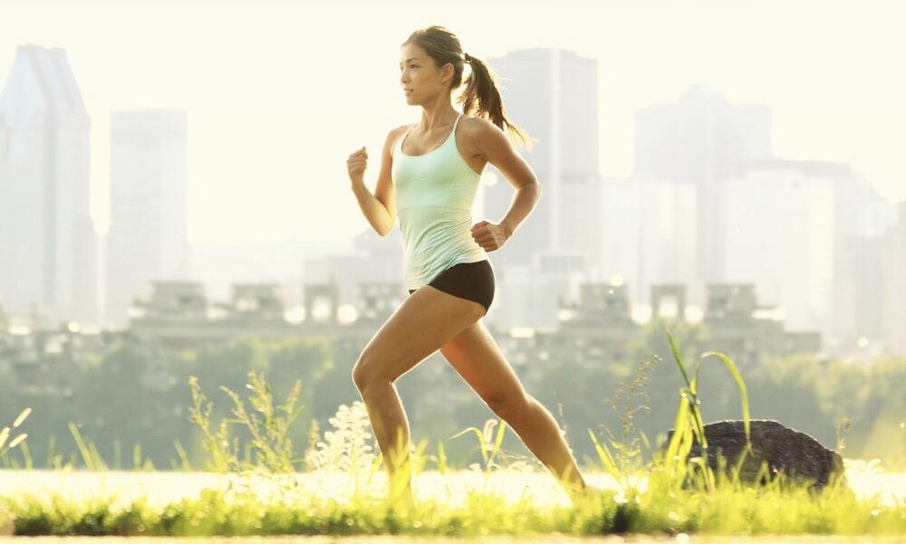 Running woman city fitness
