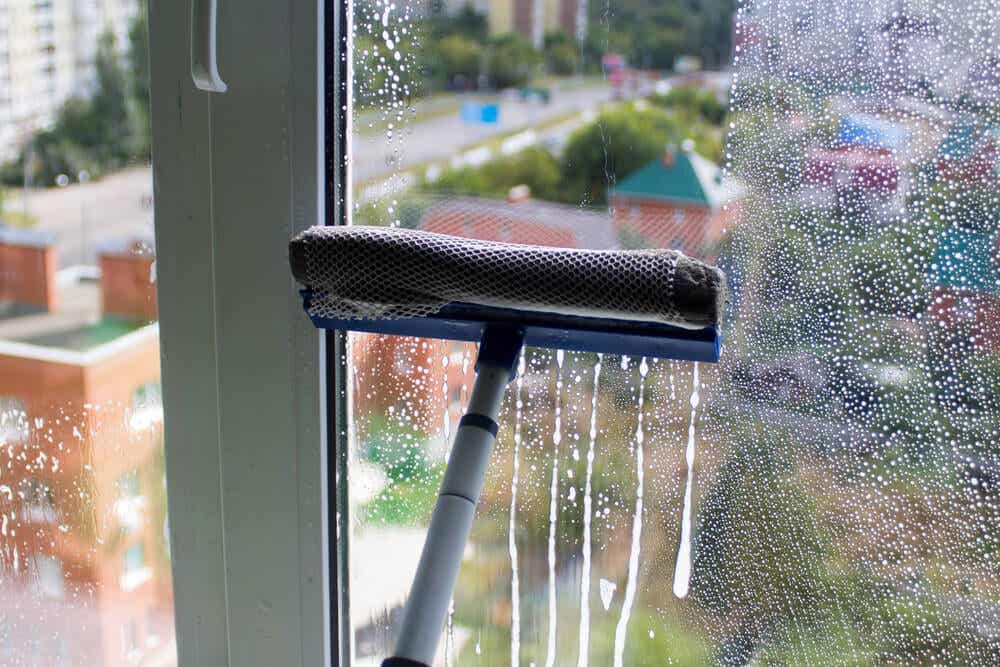 Cleaning a window.