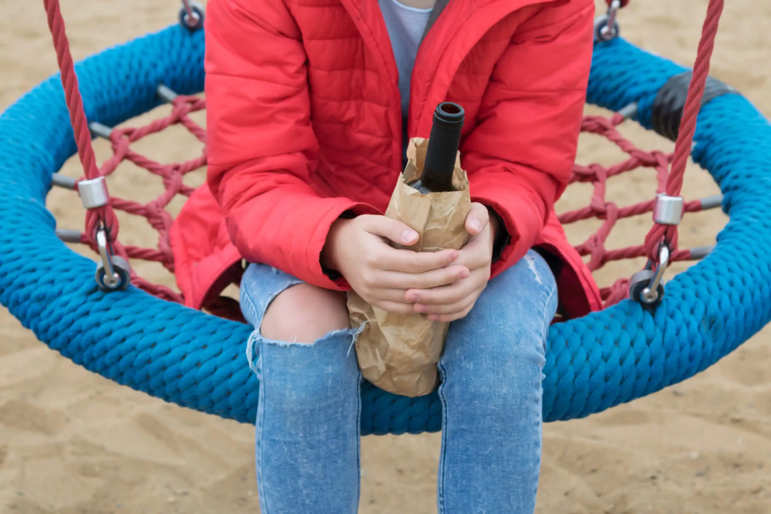 A teen with alcohol.