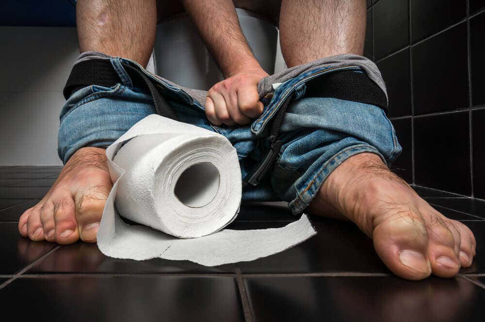 Antidiarrhoika - Mann auf der Toilette