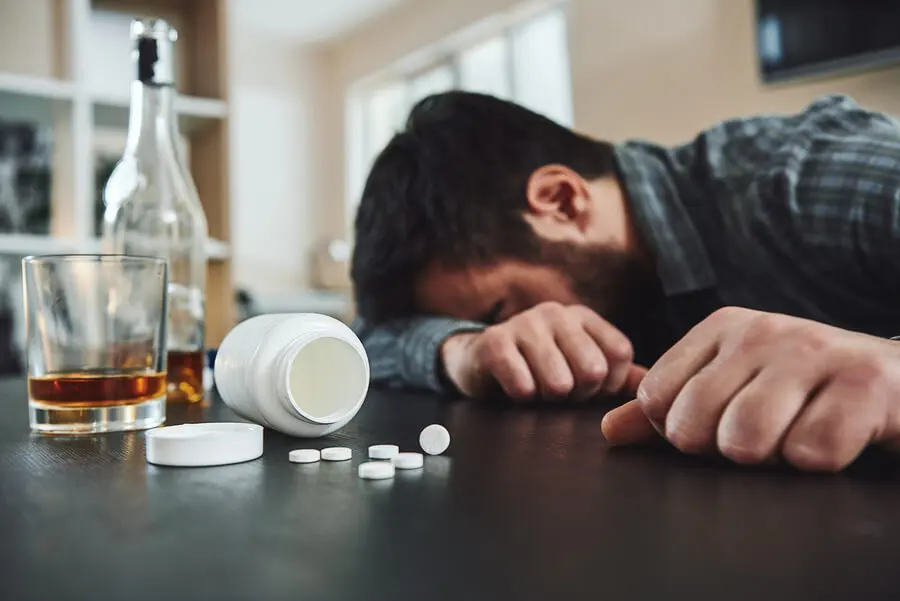 Dependência de uma droga.