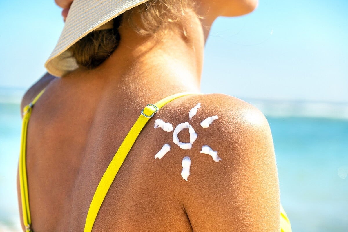 A woman with sunscreen.
