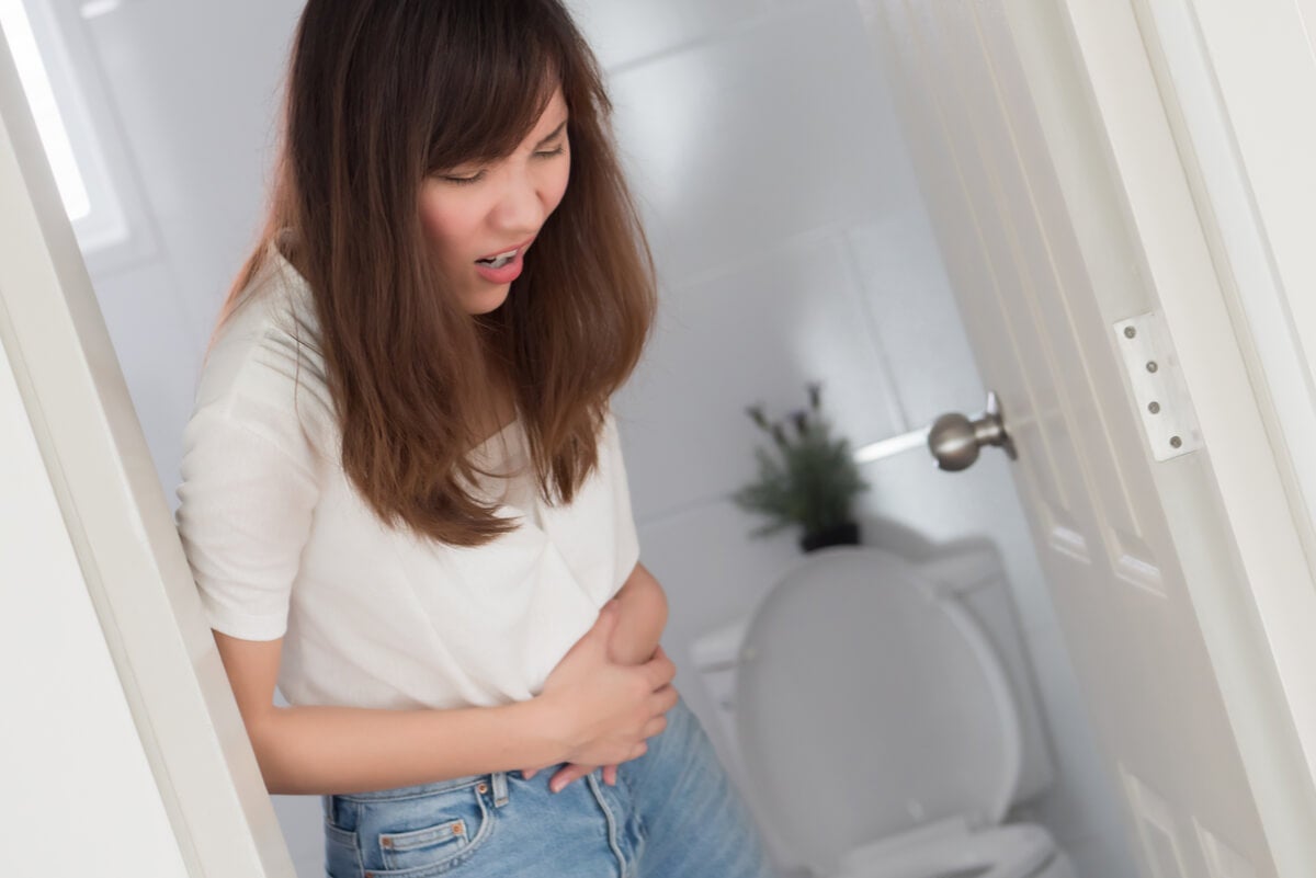 A woman with a sore stomach.