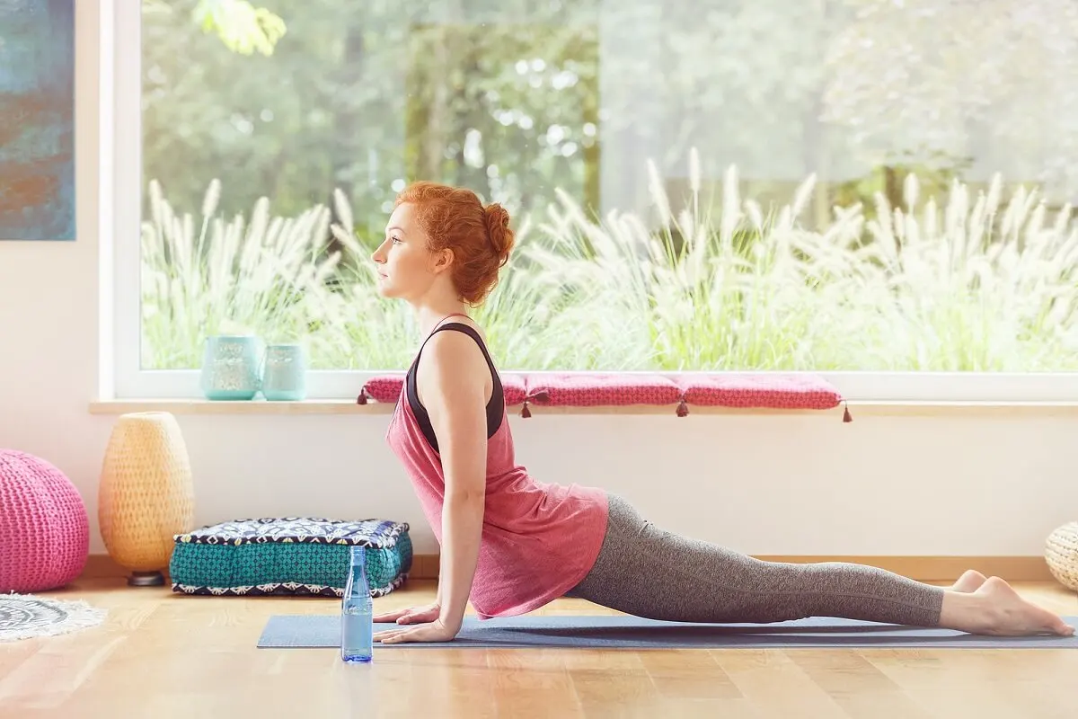 Postura del gato Pilates