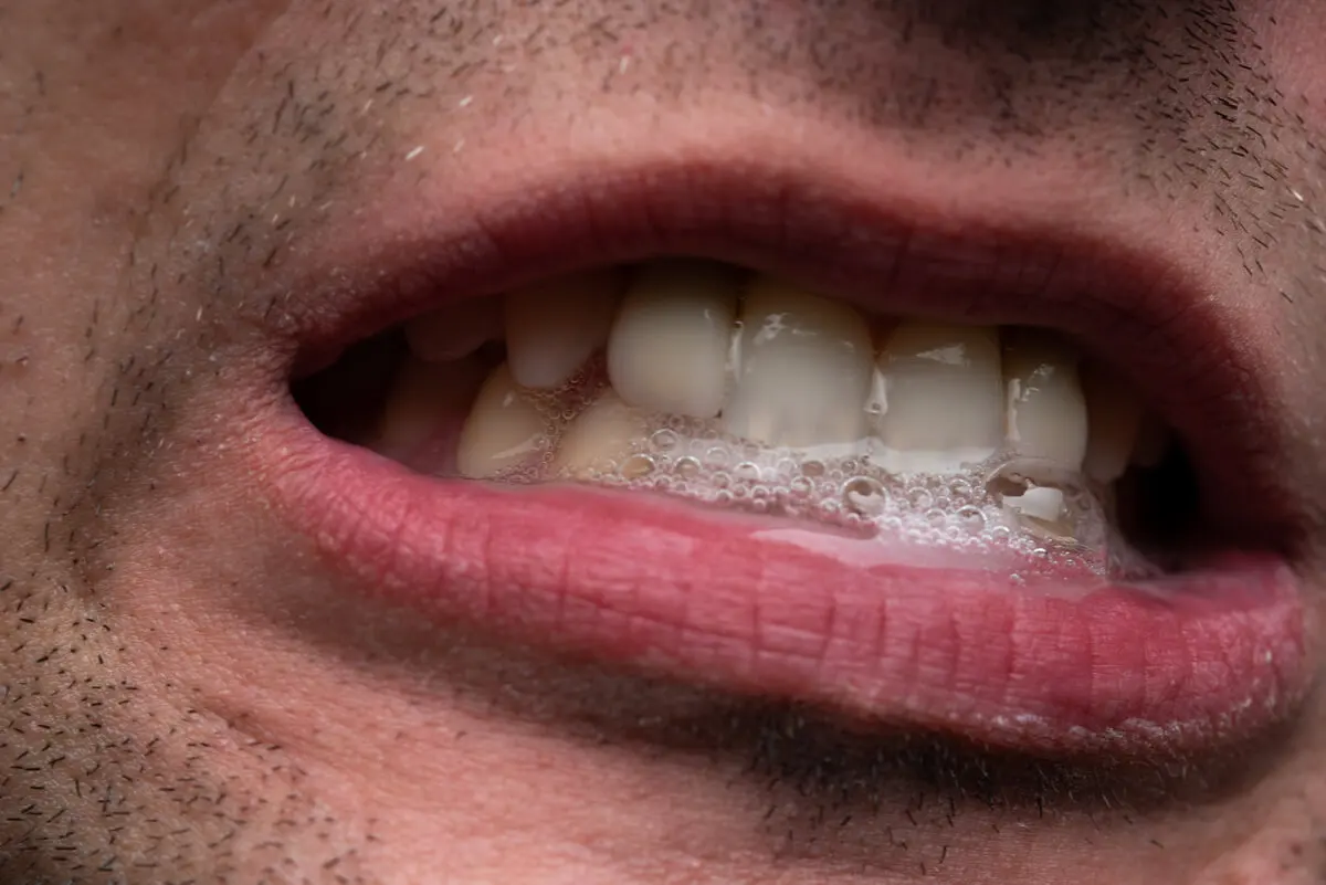 Saliva in a mouth.