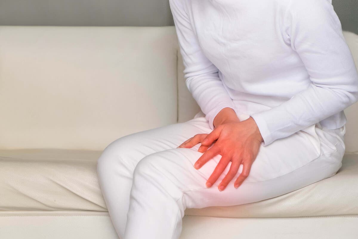Dolor en el muslo en una mujer.