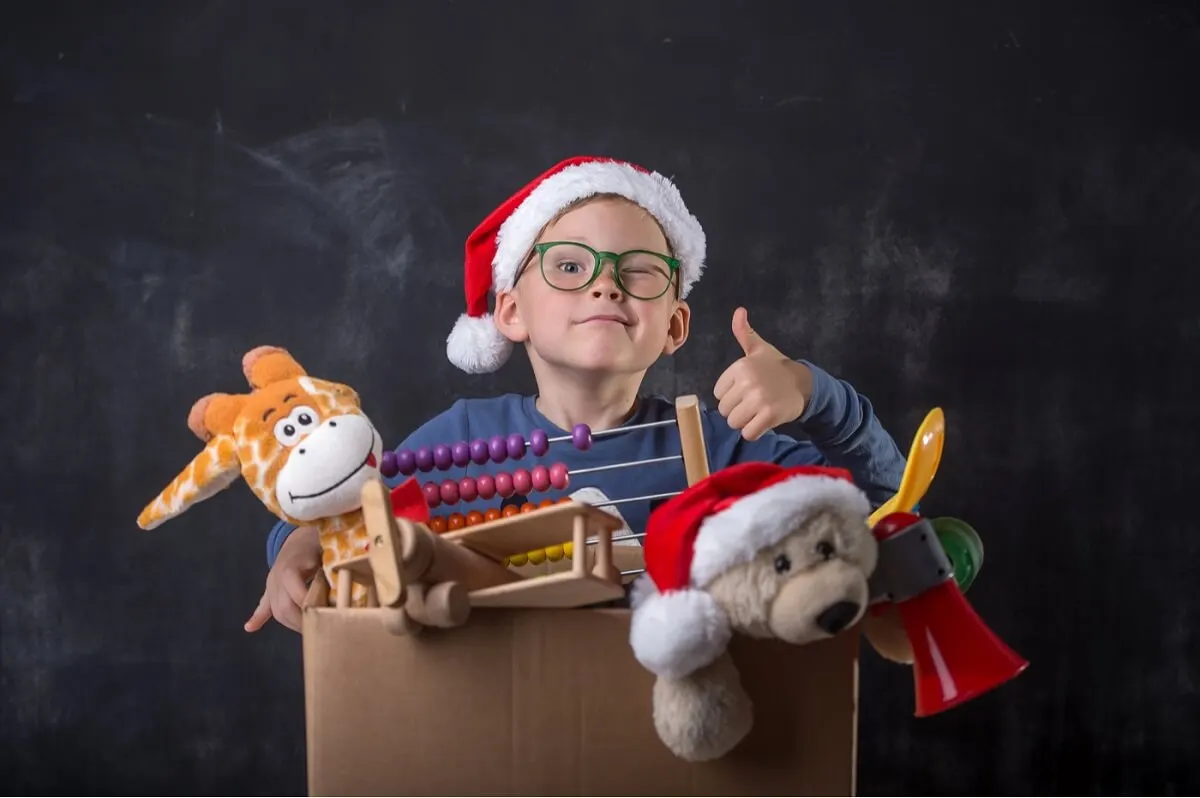 A boy with toys.