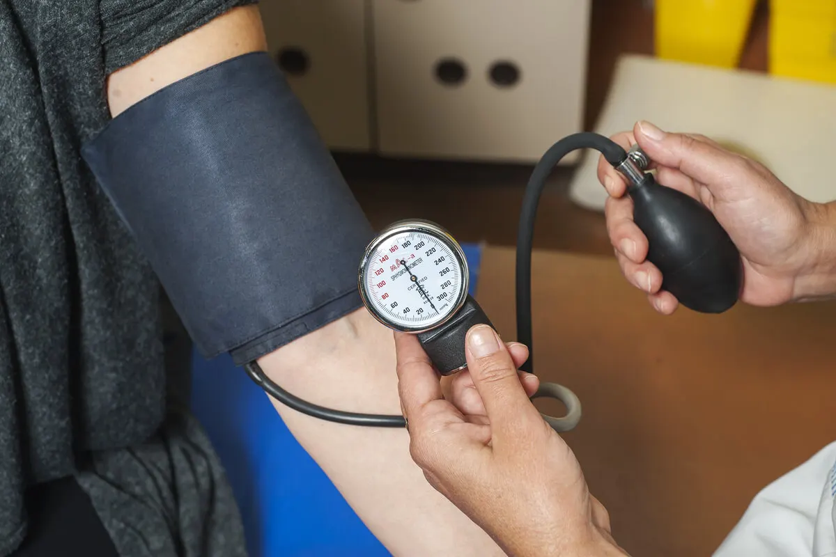 Taking blood pressure.