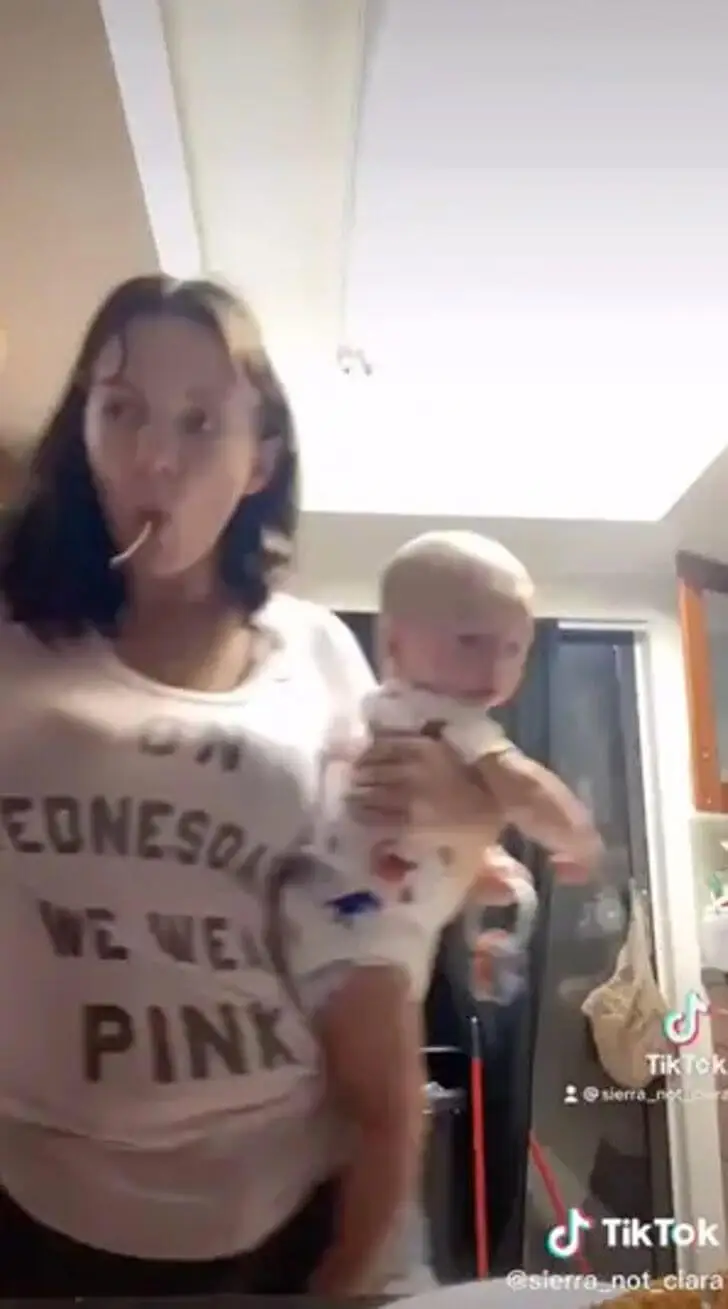 A woman with her baby.