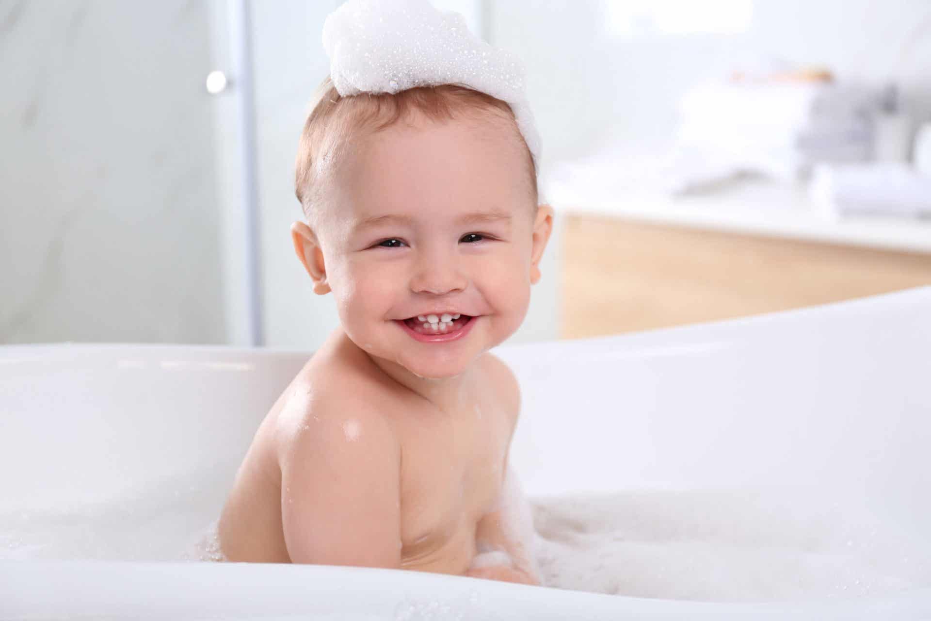 risks for babies in the bathroom: a baby in a bath