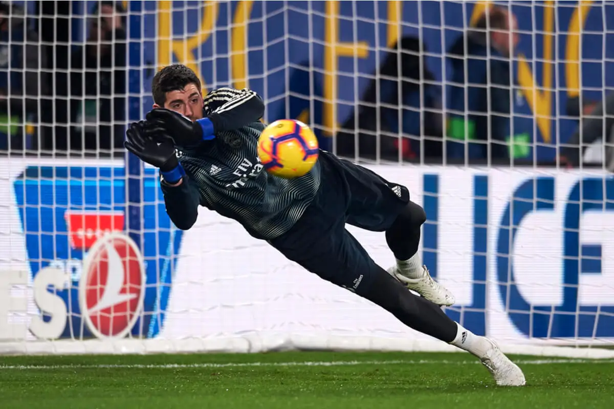 Thibaut Courtois saving a goal