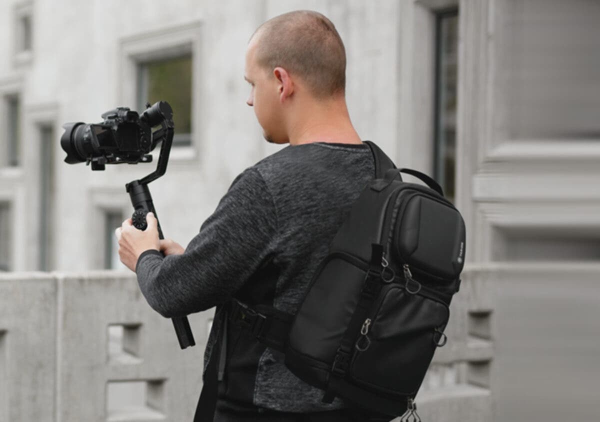 Bandolera para cámara fotográfica.