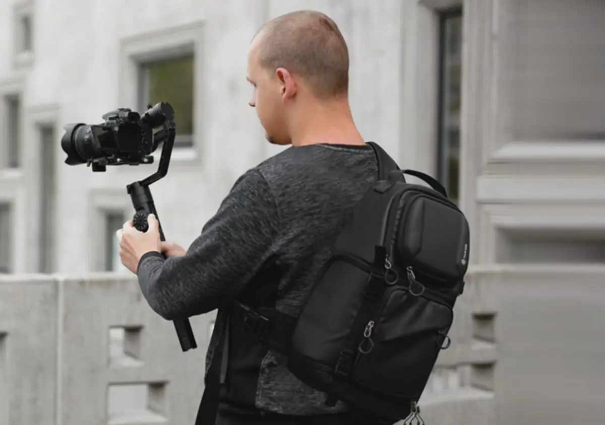 Bandolera para cámara fotográfica.