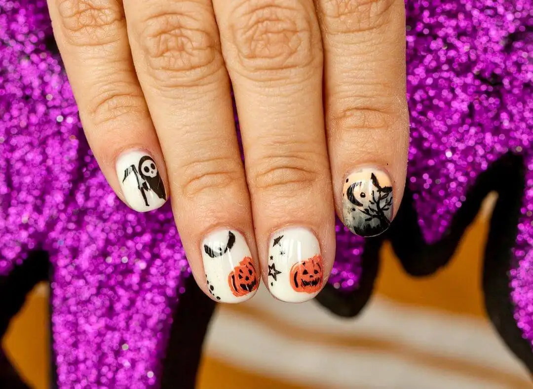 Uñas con calabazas para Halloween.