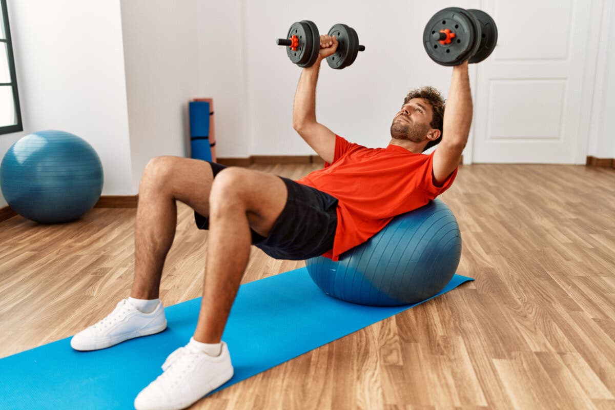 Swiss ball dumbbell press