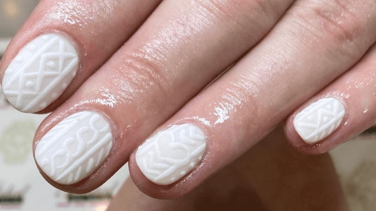 Unhas com efeito suéter.