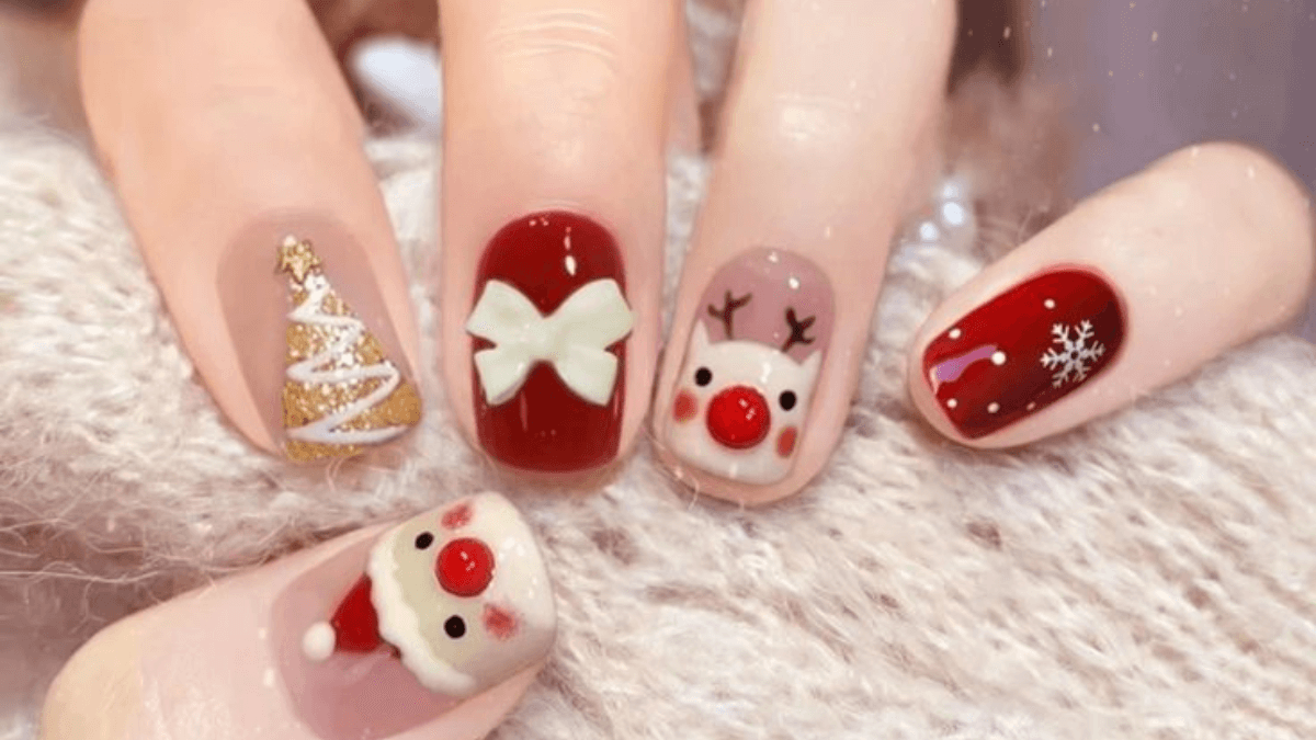 Unhas pintadas com nail art.